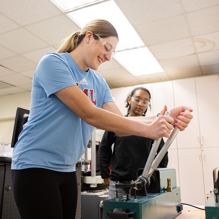 Seaver summer research, student working on equipment